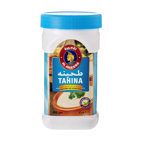 تصویر طحینه ۴۰۰ گرمی الامیره ساختهشده از کنجد خالص بوداده در بستهبندی پلاستیکی مقاوم تصویر طحینه ۴۰۰ گرمی الامیره ساختهشده از کنجد خالص بوداده در بستهبندی پلاستیکی مقاوم