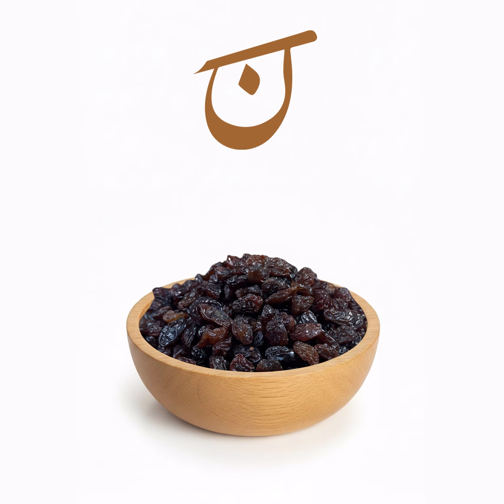 کشمش پلویی سیاه 93122 کشمش پلویی خرمایی تازه و باکیفیت در کاسه چوبی